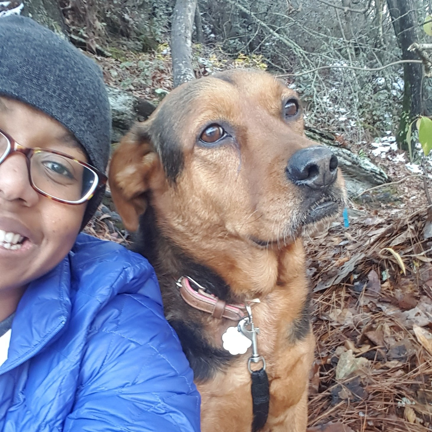Smiling girl and her dog